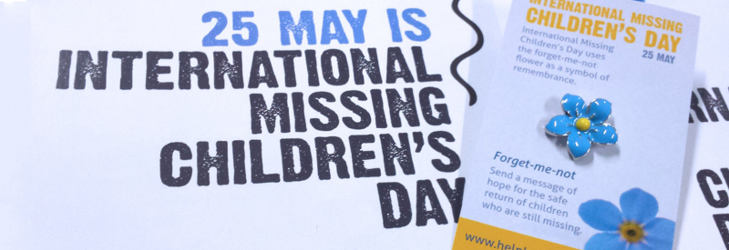 International Missing Childeren's Day graphic, also Forget-me-not promotional pin