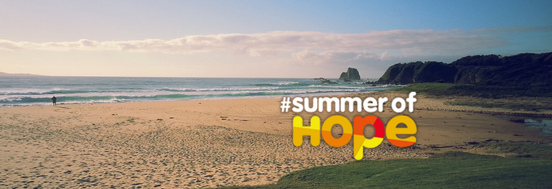 Beach sceen with summer of hope logo